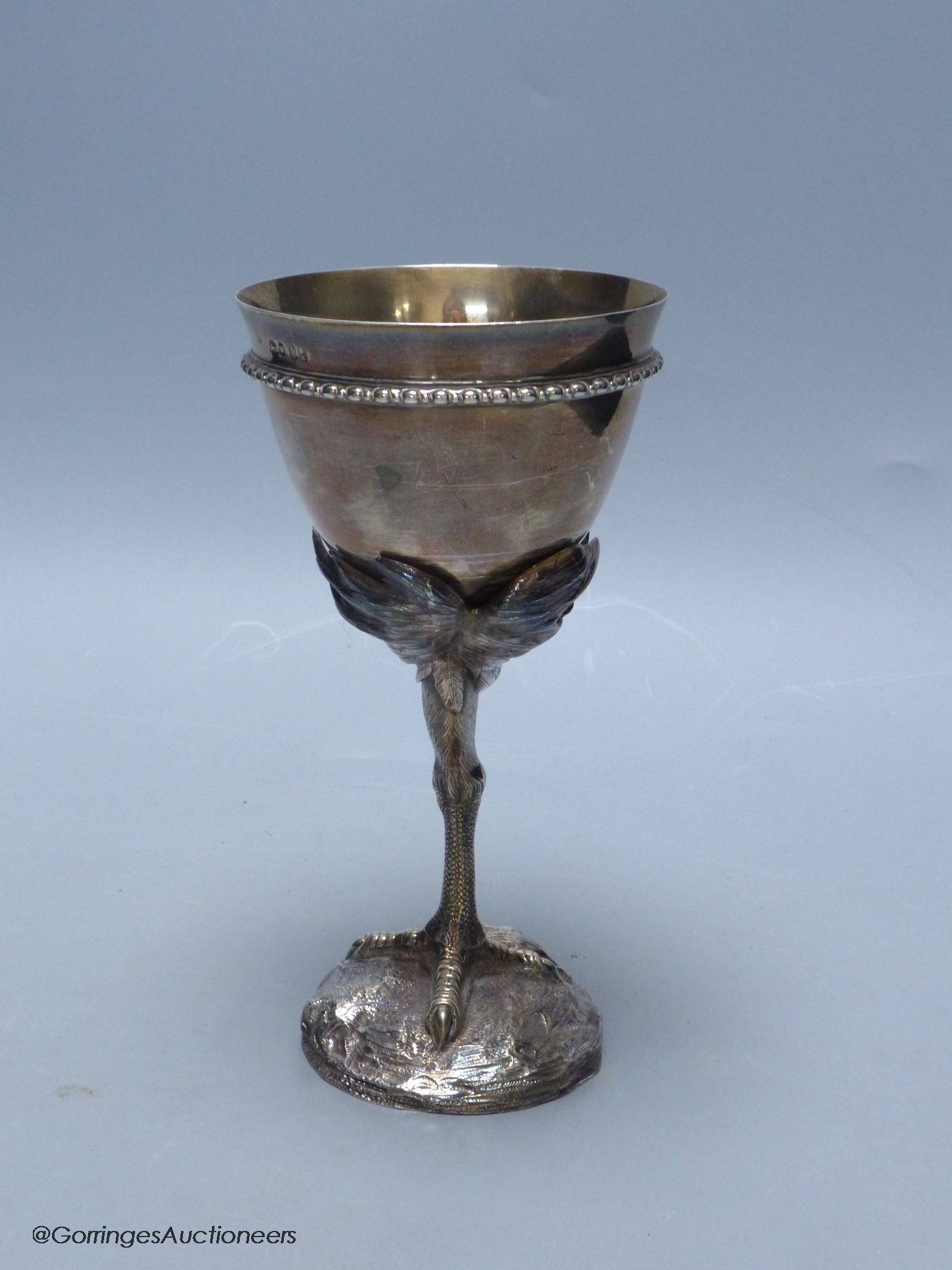 A Victorian silver goblet, the removable stem modelled as the leg of an ostrich, Robert Garrard II, London, 1859, 19.1cm, 10oz.